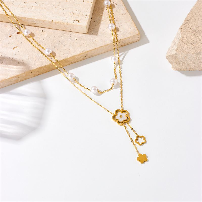 Stylish and simple double-layered pearl flower chain tassel pendant titanium steel necklace