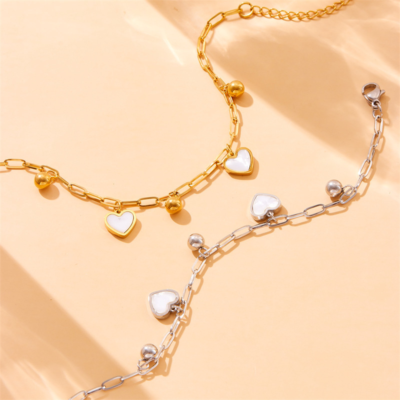 European and American style, light luxury, minimalist gold-plated stainless steel white shell heart bead pendant chain bracelet