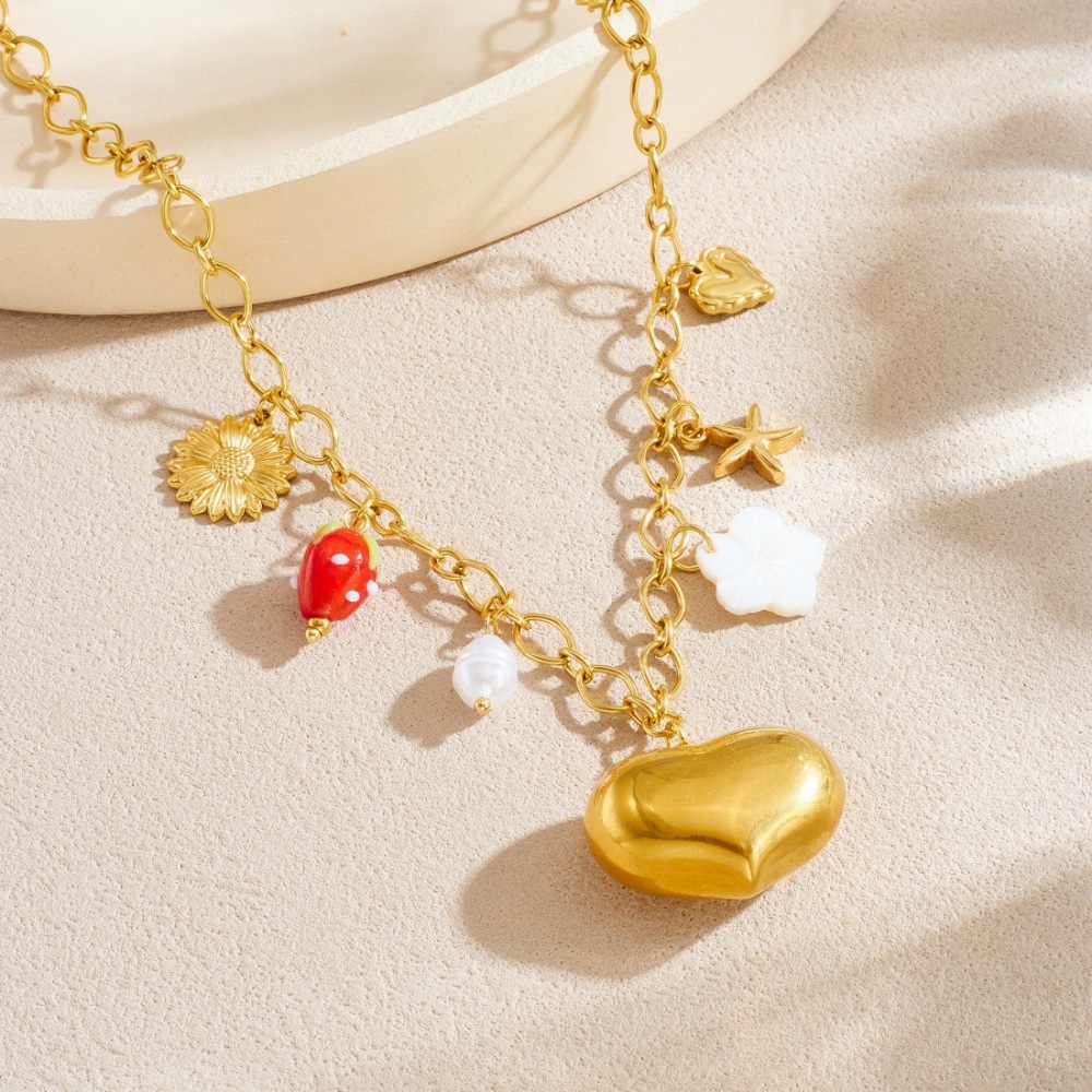Cross-border fashion niche design gold-plated hollowed-out large heart pendant clavicle chain stainless steel sunflower starfish necklace