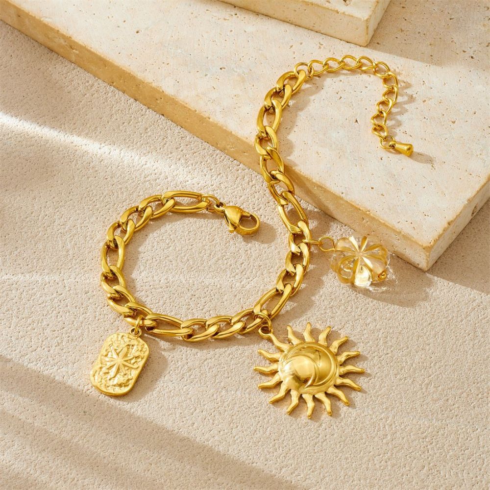 European and American cross-border fashion stainless steel bracelet and necklace set with light luxury retro sun round pendant and heart-shaped pendant for women.