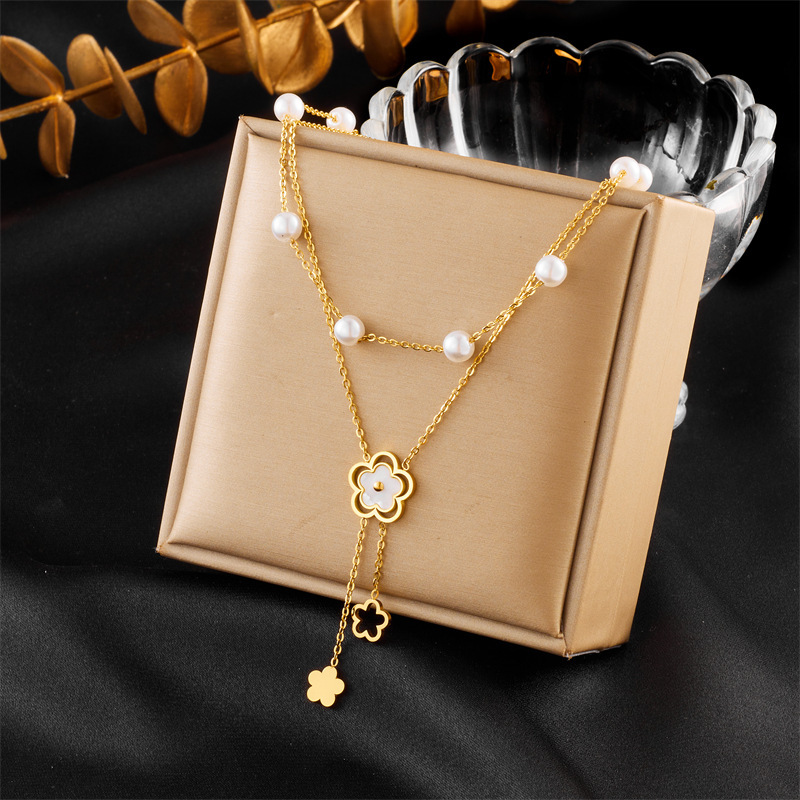 Stylish and simple double-layered pearl flower chain tassel pendant titanium steel necklace