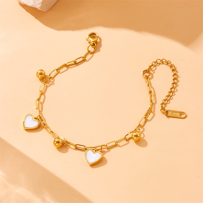European and American style, light luxury, minimalist gold-plated stainless steel white shell heart bead pendant chain bracelet