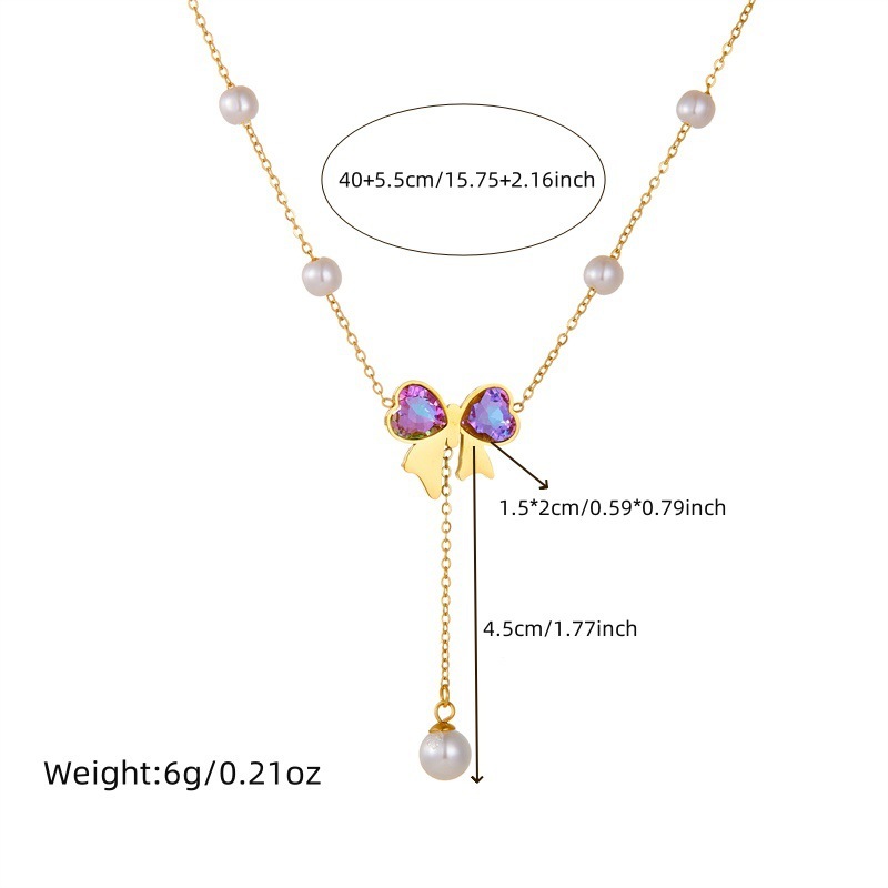 Cross-border fashion dazzling rhinestone bow gold-plated pearl chain stainless steel tassel pendant necklace and bracelet set