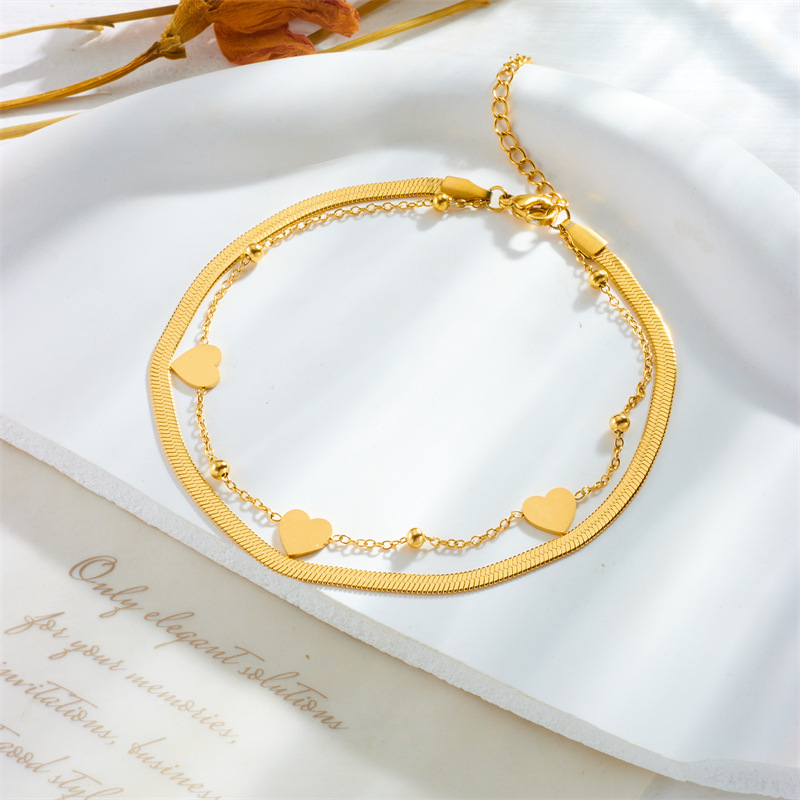 Unique design, heart-shaped chain, double-layered, gold-plated titanium steel, fashionable and versatile anklet.