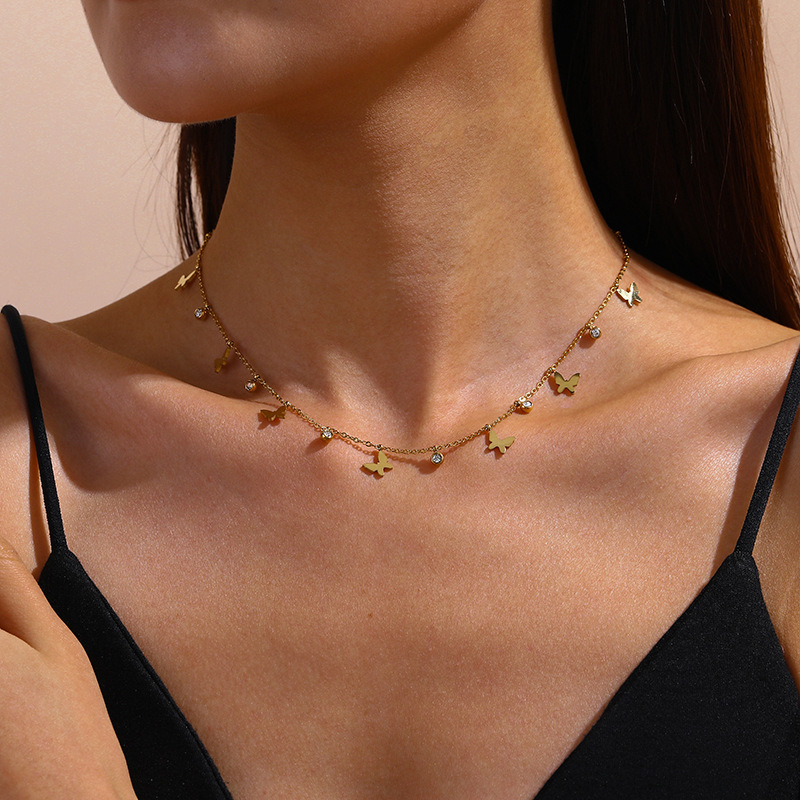 Stylish and simple diamond-encrusted five-pointed star butterfly pendant stainless steel necklace, versatile for women.