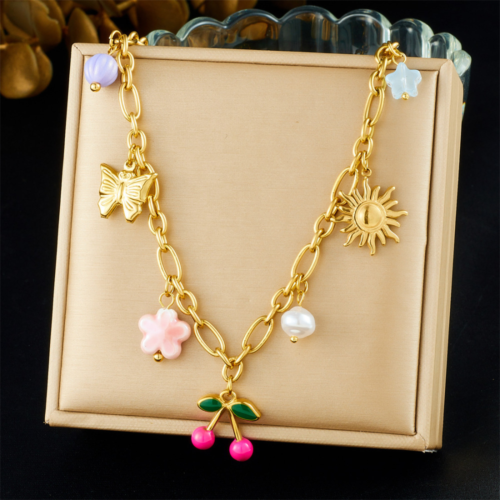 New retro pearl flower drip cherry clavicle chain, sweet and versatile gold-plated sun butterfly pendant necklace