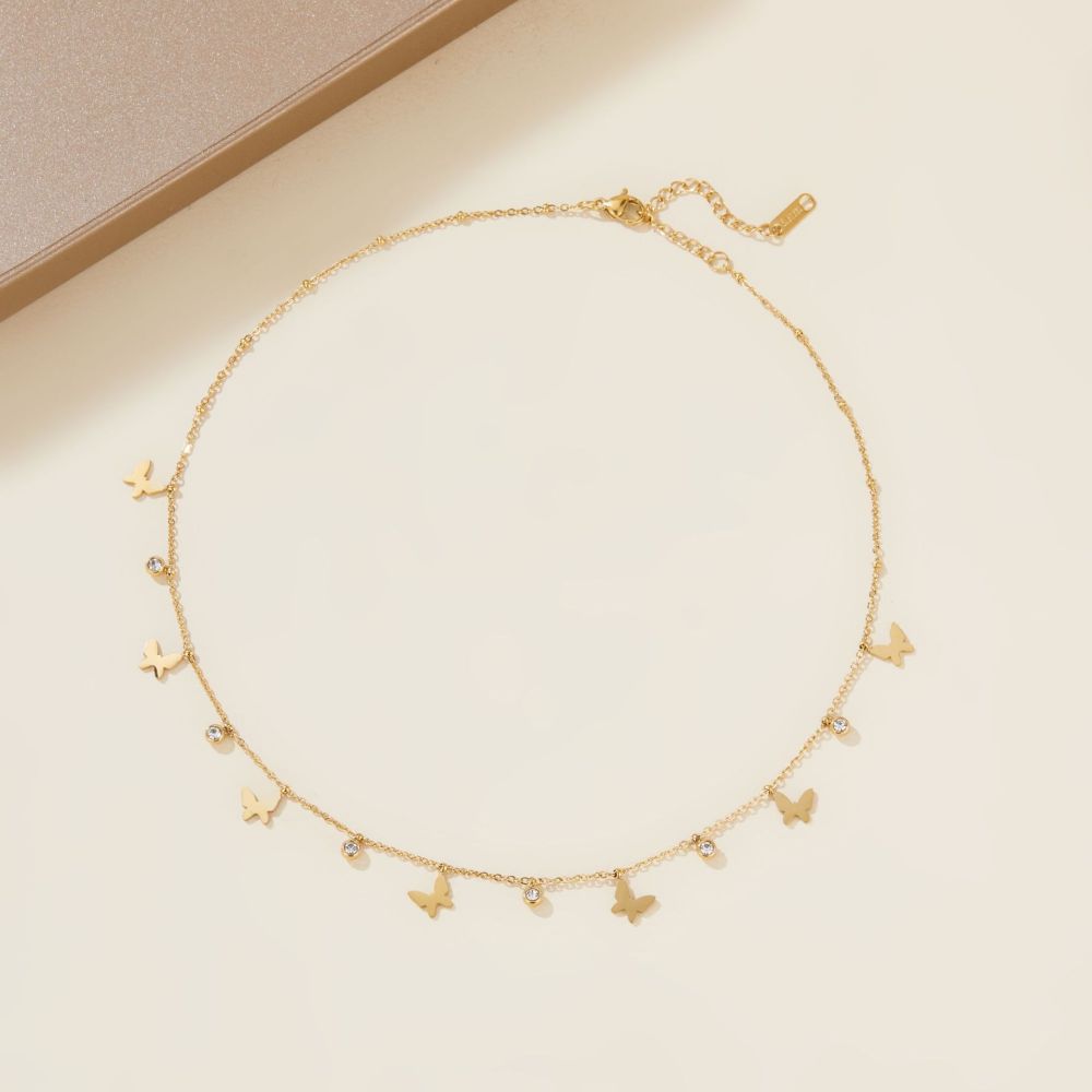 Stylish and simple diamond-encrusted five-pointed star butterfly pendant stainless steel necklace, versatile for women.