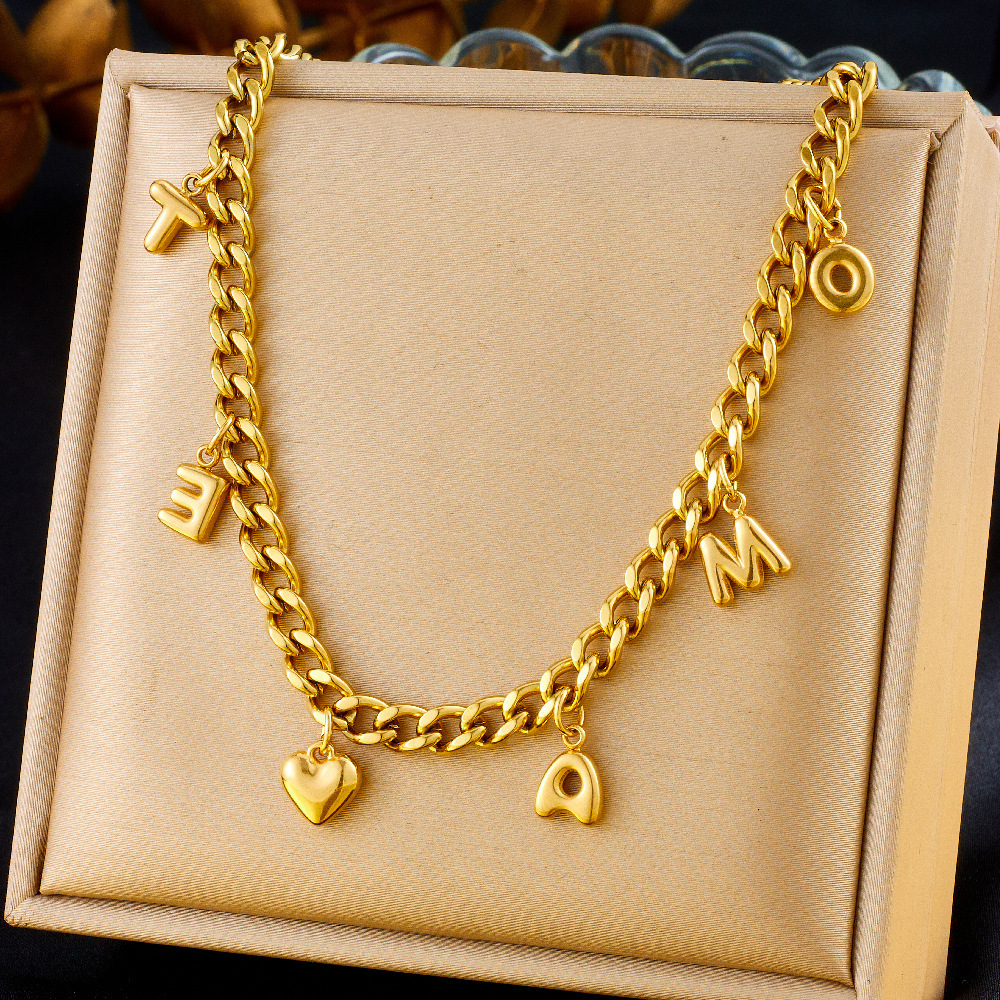 Fashionable and unique resort-style ocean-themed necklace with dripping dolphin, pearl, seashell, and starfish design, featuring a chunky stainless steel chain.