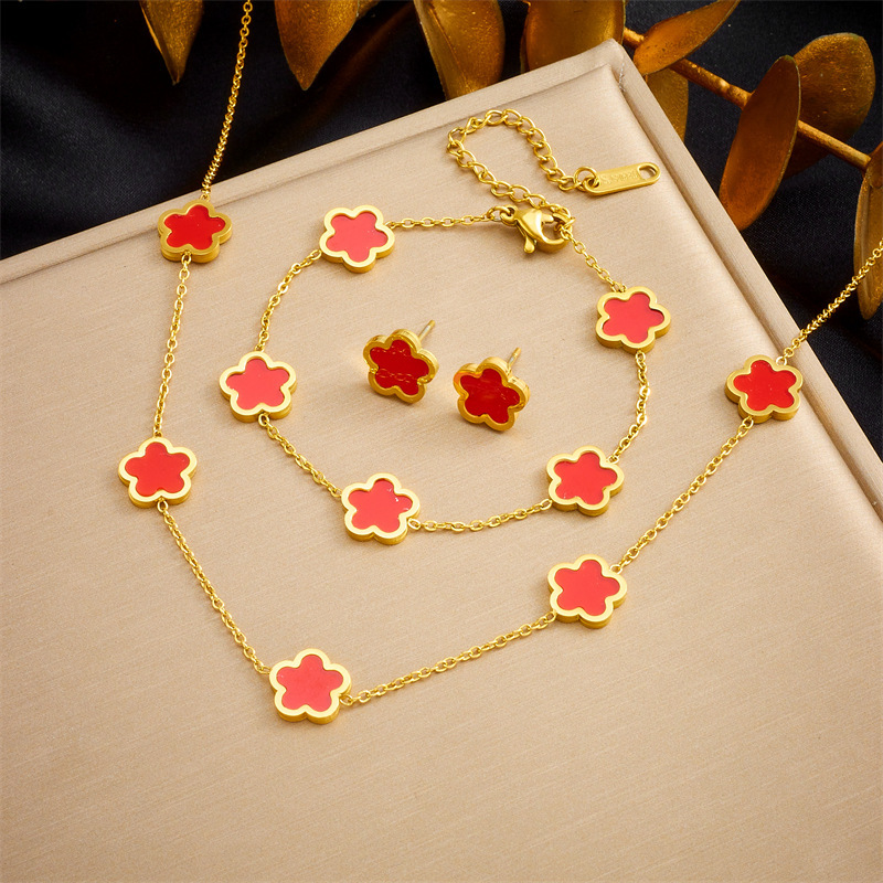 European and American style retro five-petal flower accessories stainless steel gold-plated earrings, bracelets, necklaces, three-piece set