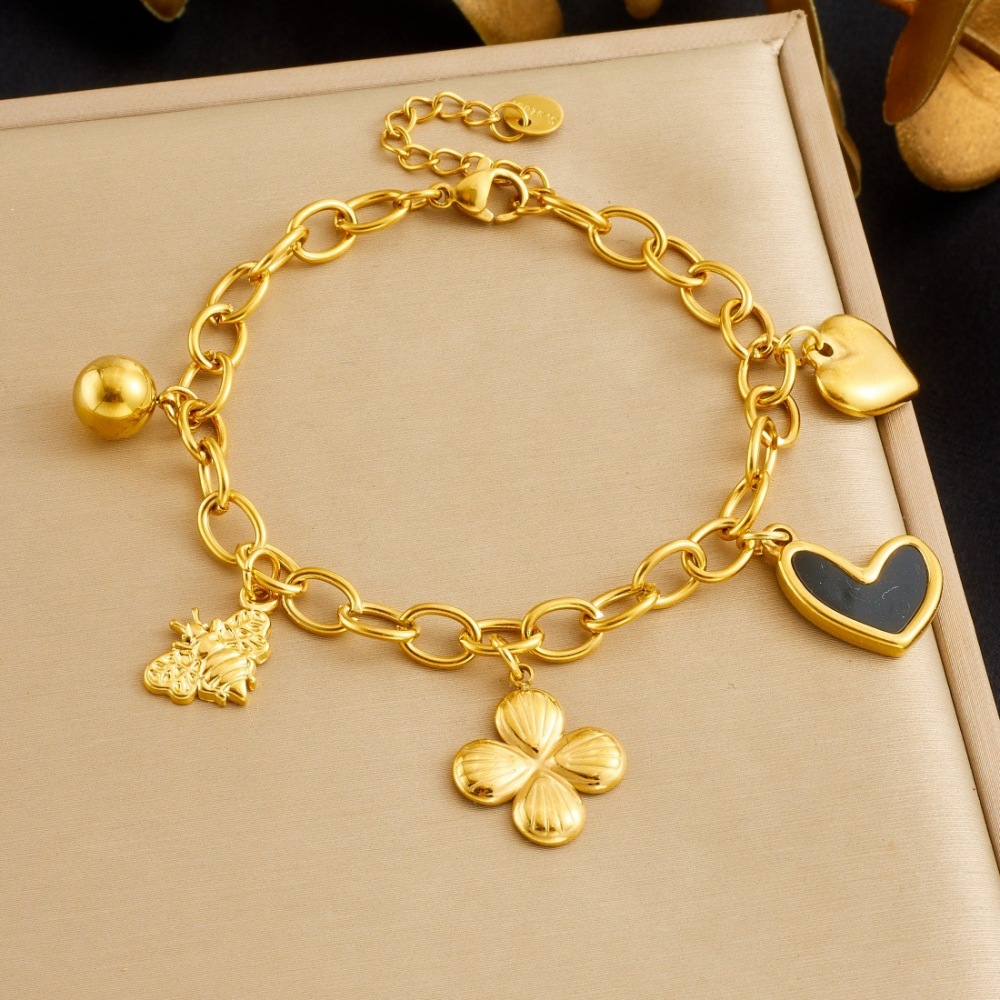 Korean style, fashionable and simple, gold-plated black dripping heart and flower pendant, stainless steel chain, versatile jewelry bracelet.