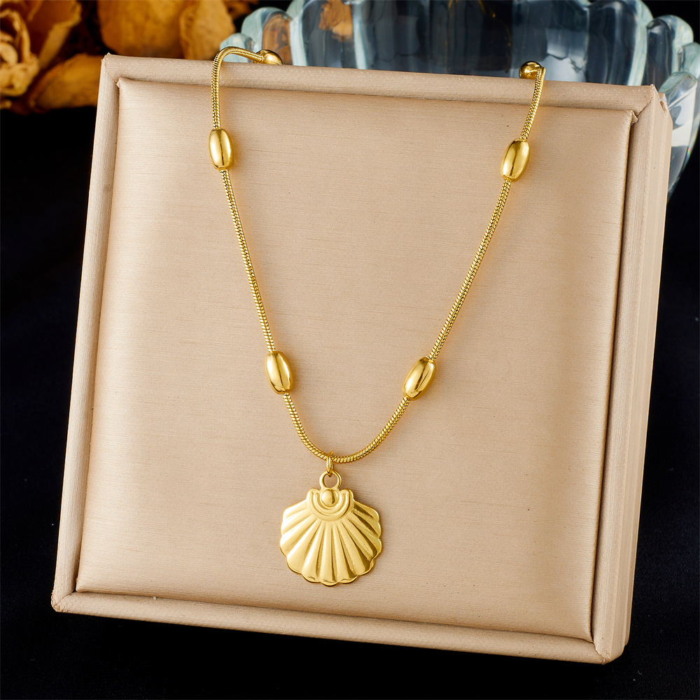 Cross-border fashion ocean series accessories pendant gold-plated stainless steel starfish shell multi-element dripping butterfly necklace
