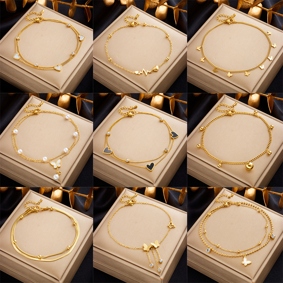 Fashionable, niche, high-end, minimalist, versatile, elegant metallic titanium steel heart and butterfly pendant anklet