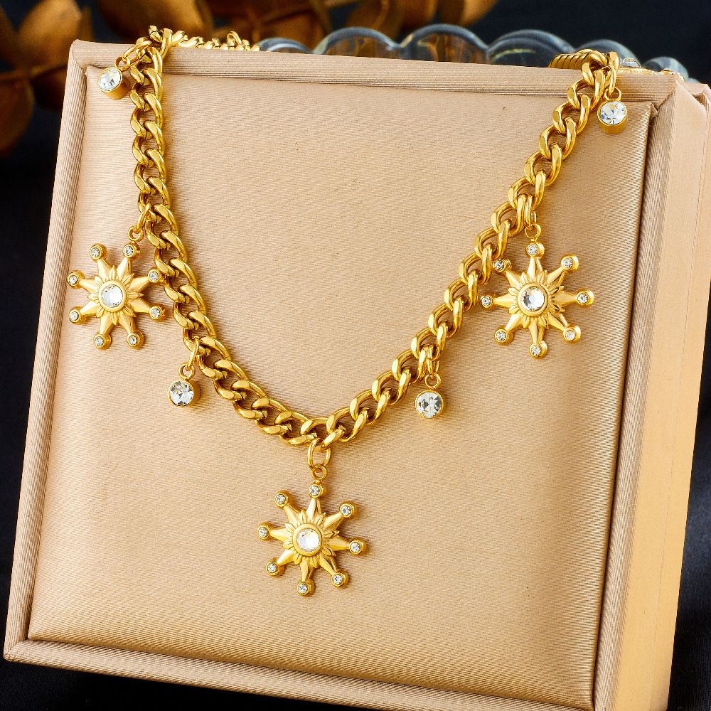 Fashionable and unique resort-style ocean-themed necklace with dripping dolphin, pearl, seashell, and starfish design, featuring a chunky stainless steel chain.