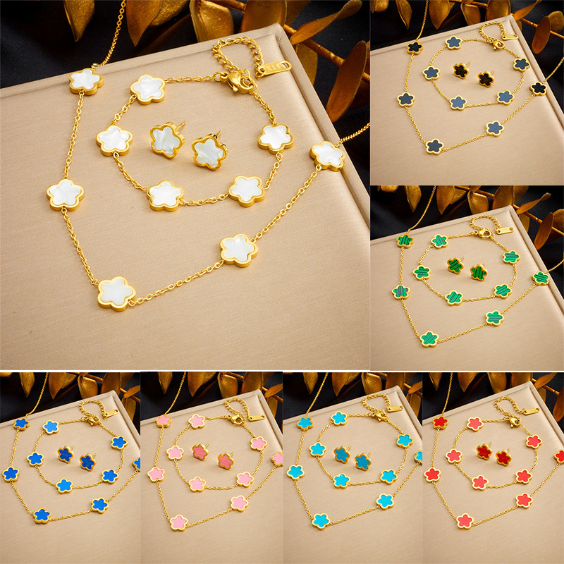 European and American style retro five-petal flower accessories stainless steel gold-plated earrings, bracelets, necklaces, three-piece set