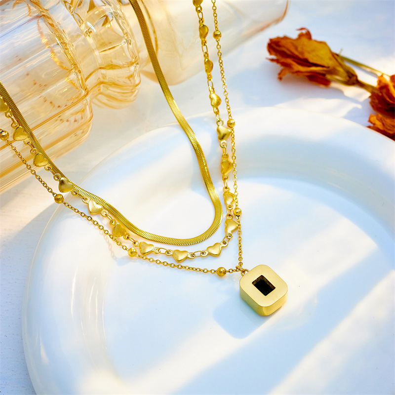 European and American style multi-layered mixed and matched heart snake chain emerald diamond square pendant high-end versatile necklace