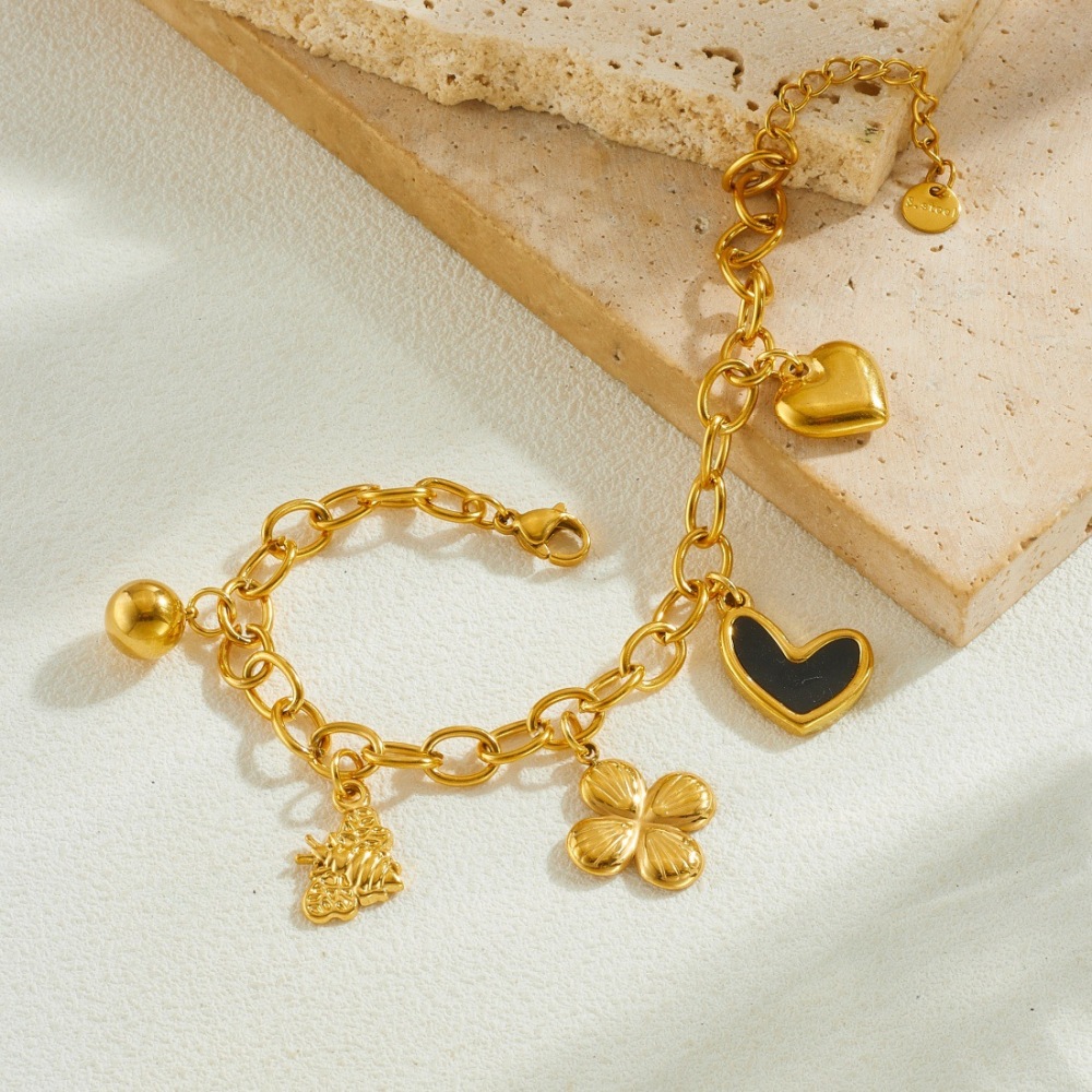 Korean style, fashionable and simple, gold-plated black dripping heart and flower pendant, stainless steel chain, versatile jewelry bracelet.