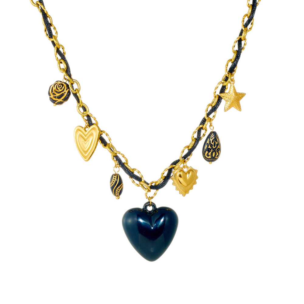 Niche fashion design with multi-element sculpted floral geometric pendant, gold-plated black heart accessory necklace.
