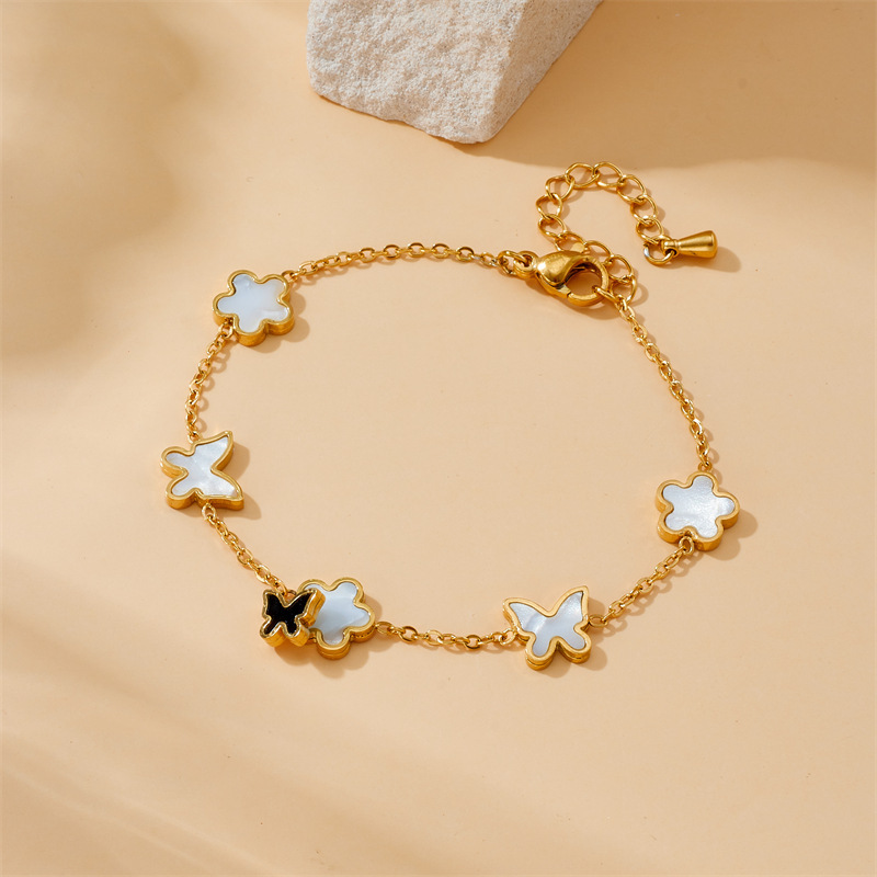 Niche Fashion Retro Style Non-fading Gold Plated Flower and Butterfly Accessories Chain Stainless Steel Bracelet Earring Necklace Set