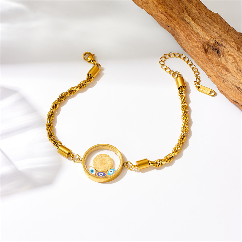 Fashionable retro creative personalized round pendant portrait eyes twisted chain gold-plated titanium steel bracelet
