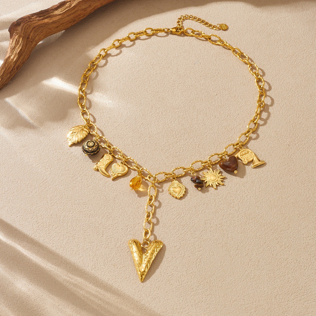 European and American cross-border fashion retro multi-element pendant chain tassel long heart pendant gold-plated stainless steel necklace