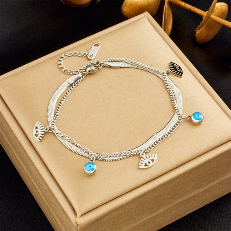 European and American style niche retro high-end double-layered diamond-encrusted round blue eye star lightning pendant bracelet