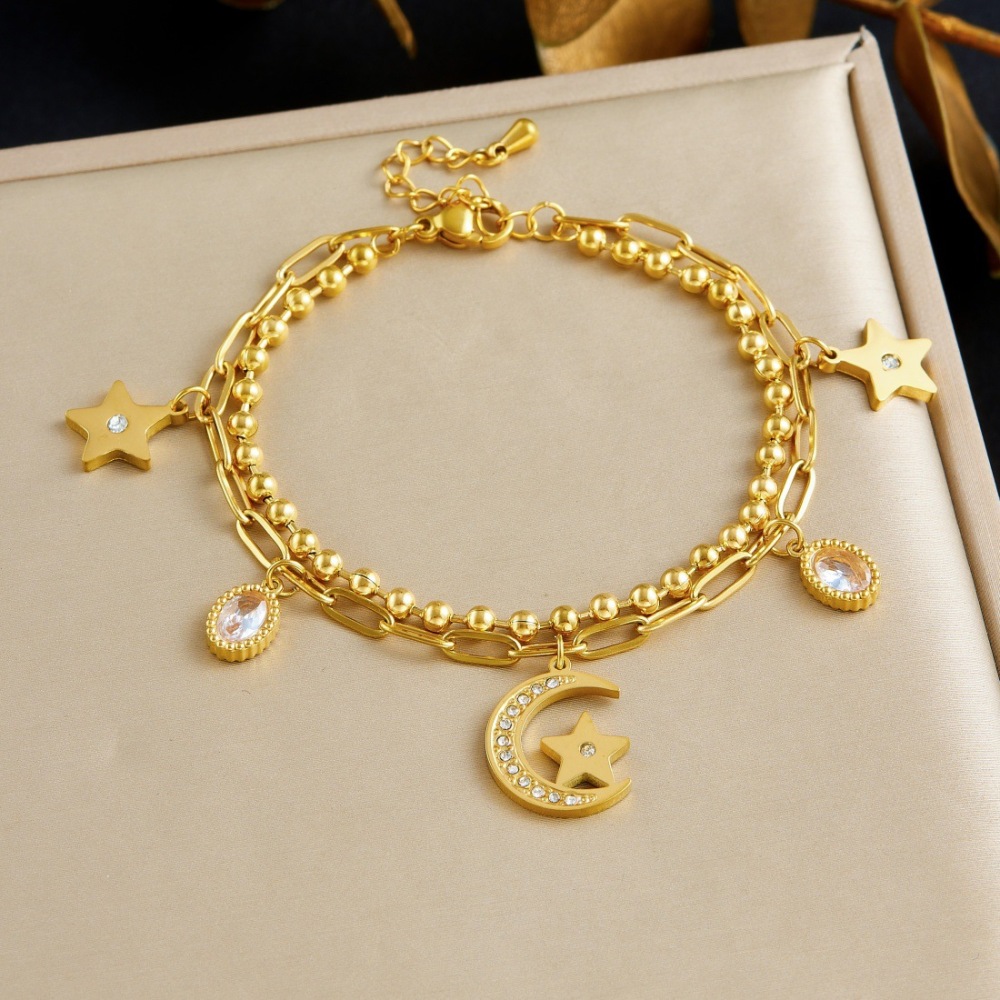 Trendy, niche, minimalist, cool-toned diamond-encrusted star, moon, and flower pendant, double-layered stainless steel gold-plated versatile bracelet.
