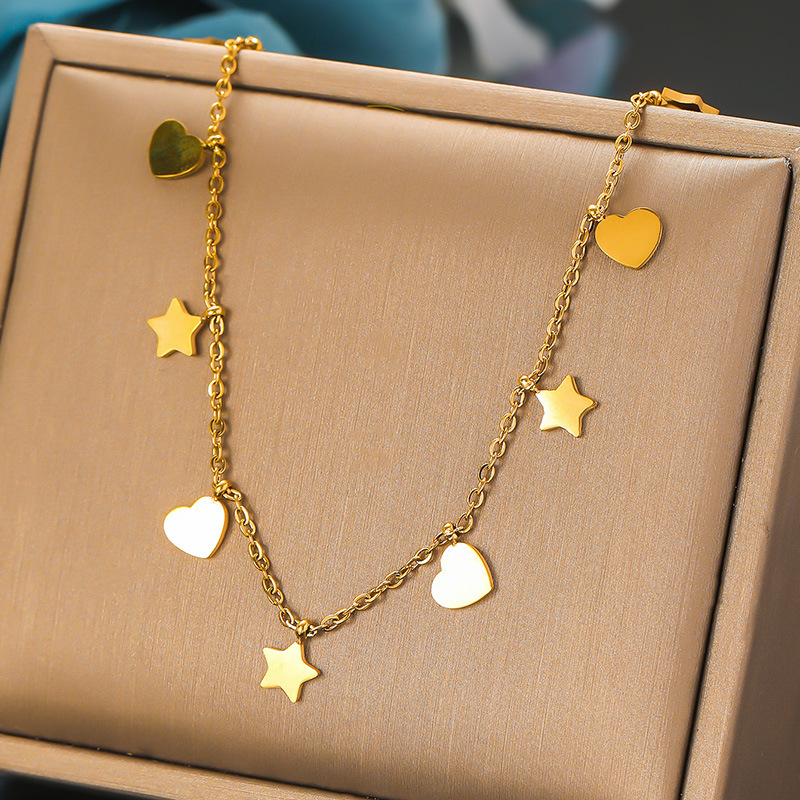 Korean style, fashionable, simple, versatile stainless steel polished heart and star accessory chain pendant necklace for commuting and everyday wear.