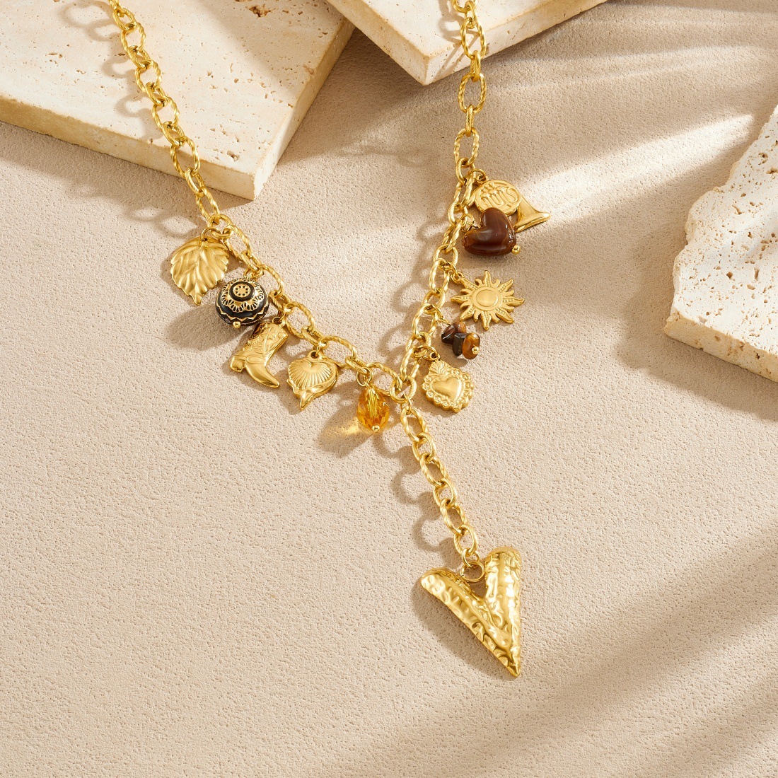 European and American cross-border fashion retro multi-element pendant chain tassel long heart pendant gold-plated stainless steel necklace
