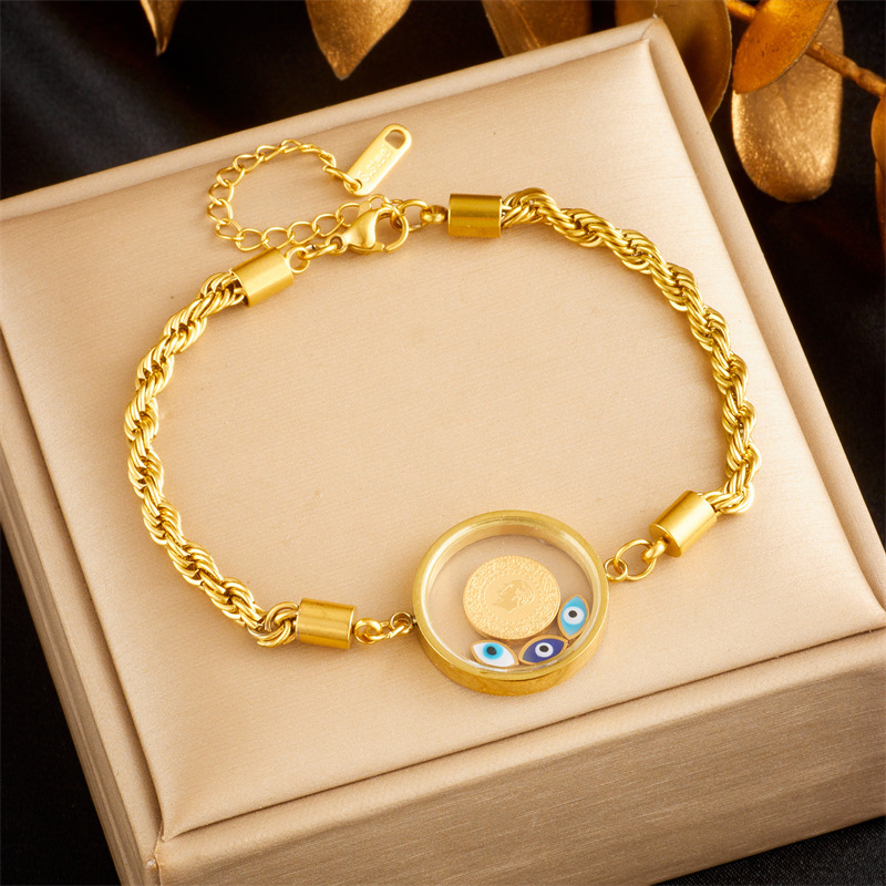 Fashionable retro creative personalized round pendant portrait eyes twisted chain gold-plated titanium steel bracelet