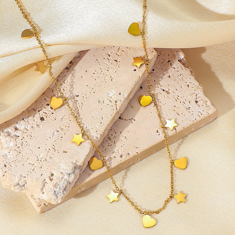 Korean style, fashionable, simple, versatile stainless steel polished heart and star accessory chain pendant necklace for commuting and everyday wear.