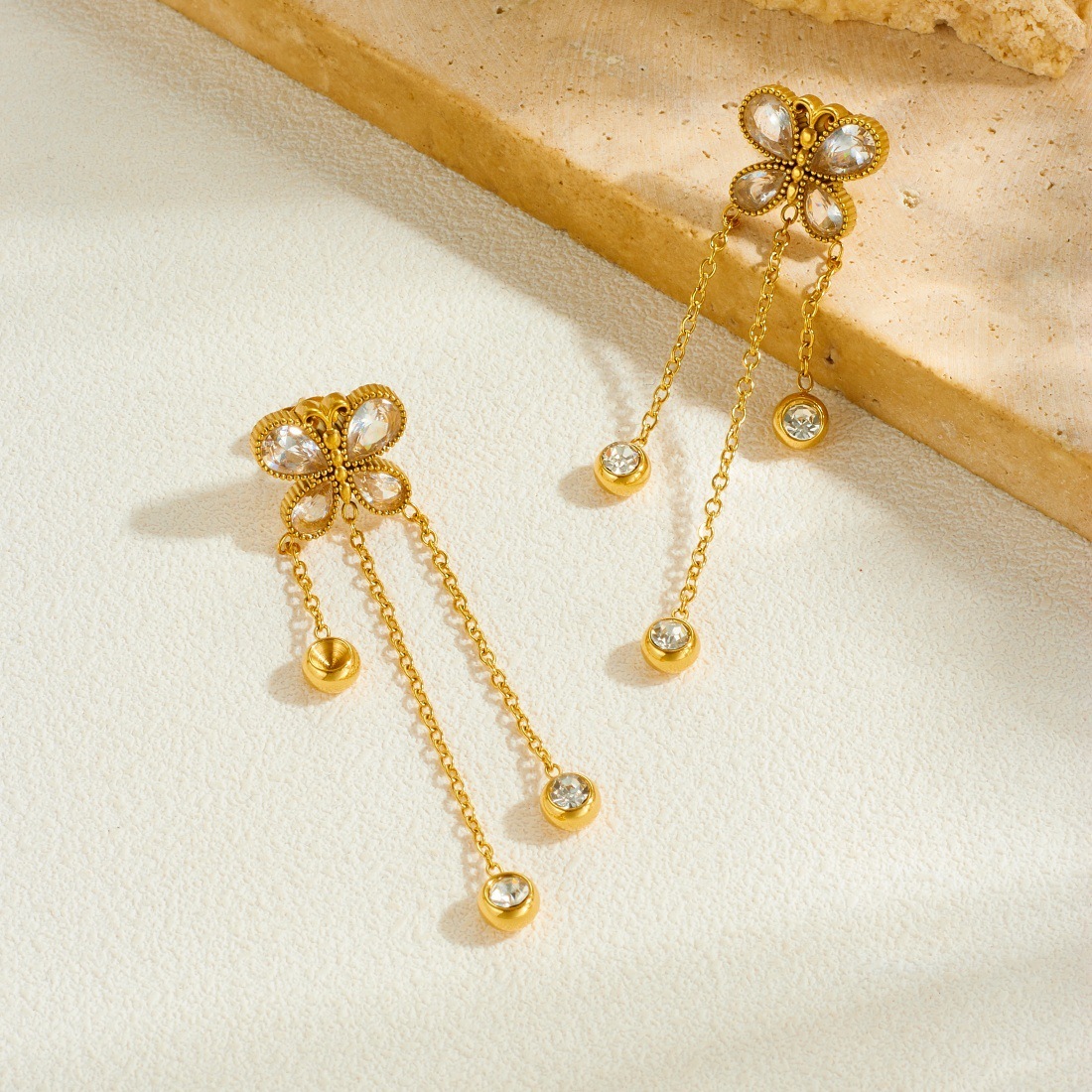 Stylish and simple everyday wear long dangling tassel chain round pendant butterfly gold-plated earrings
