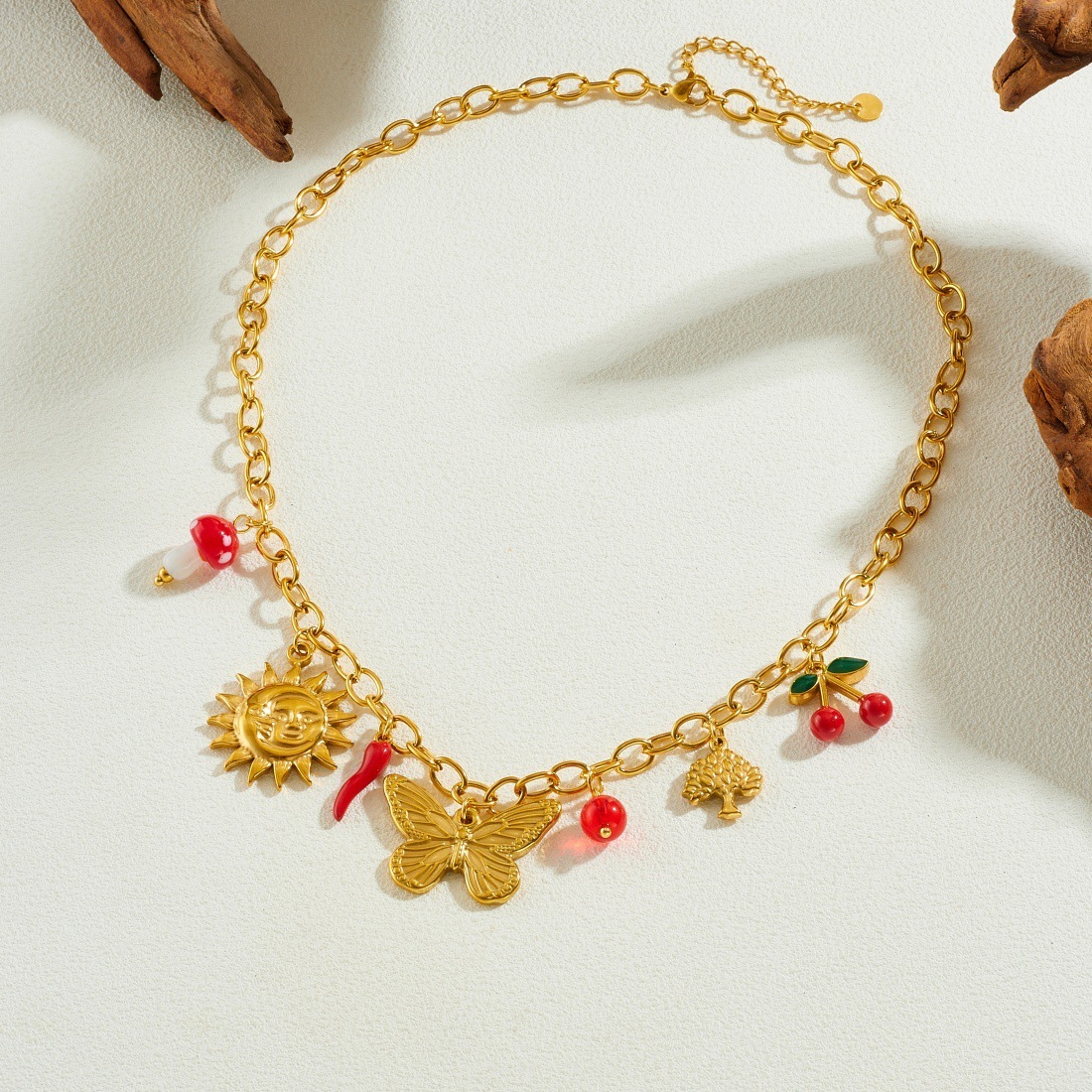 Cross-border fashion gold-plated multi-element pendant sun bow dripping cherry pendant stainless steel jewelry necklace