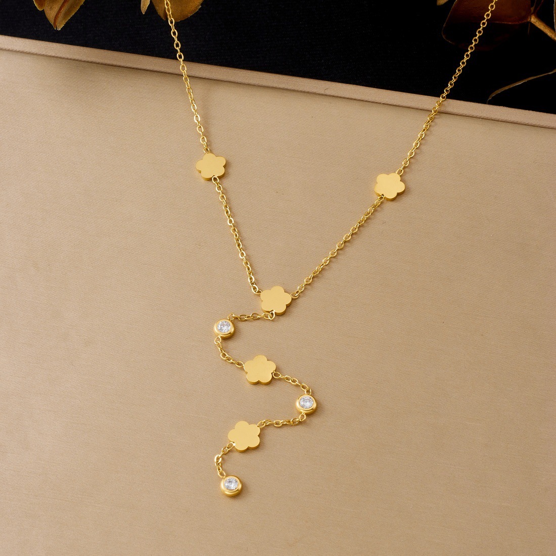 Fashionable cross-border gold-plated diamond-encrusted polished flower accessory pendant chain tassel long stainless steel jewelry necklace