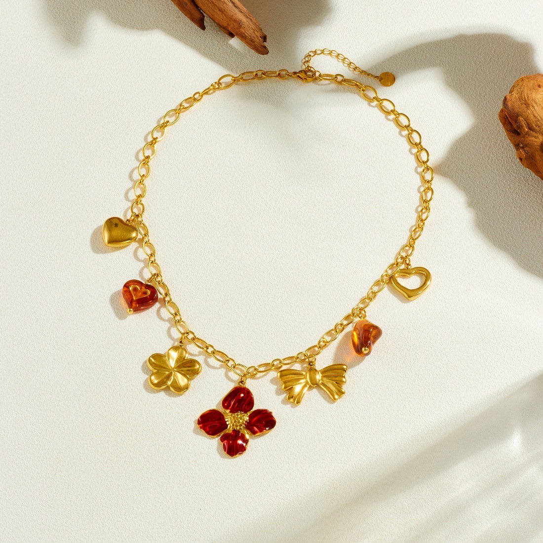 Cross-border fashion, light luxury, retro gold-plated drip flower bow heart pendant chain stainless steel jewelry necklace