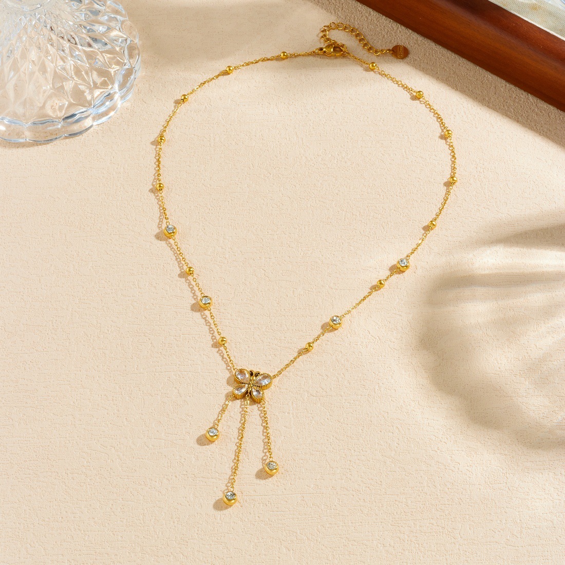 Korean style fashionable rhinestone butterfly teardrop pendant tassel chain stainless steel long gold-plated simple jewelry necklace