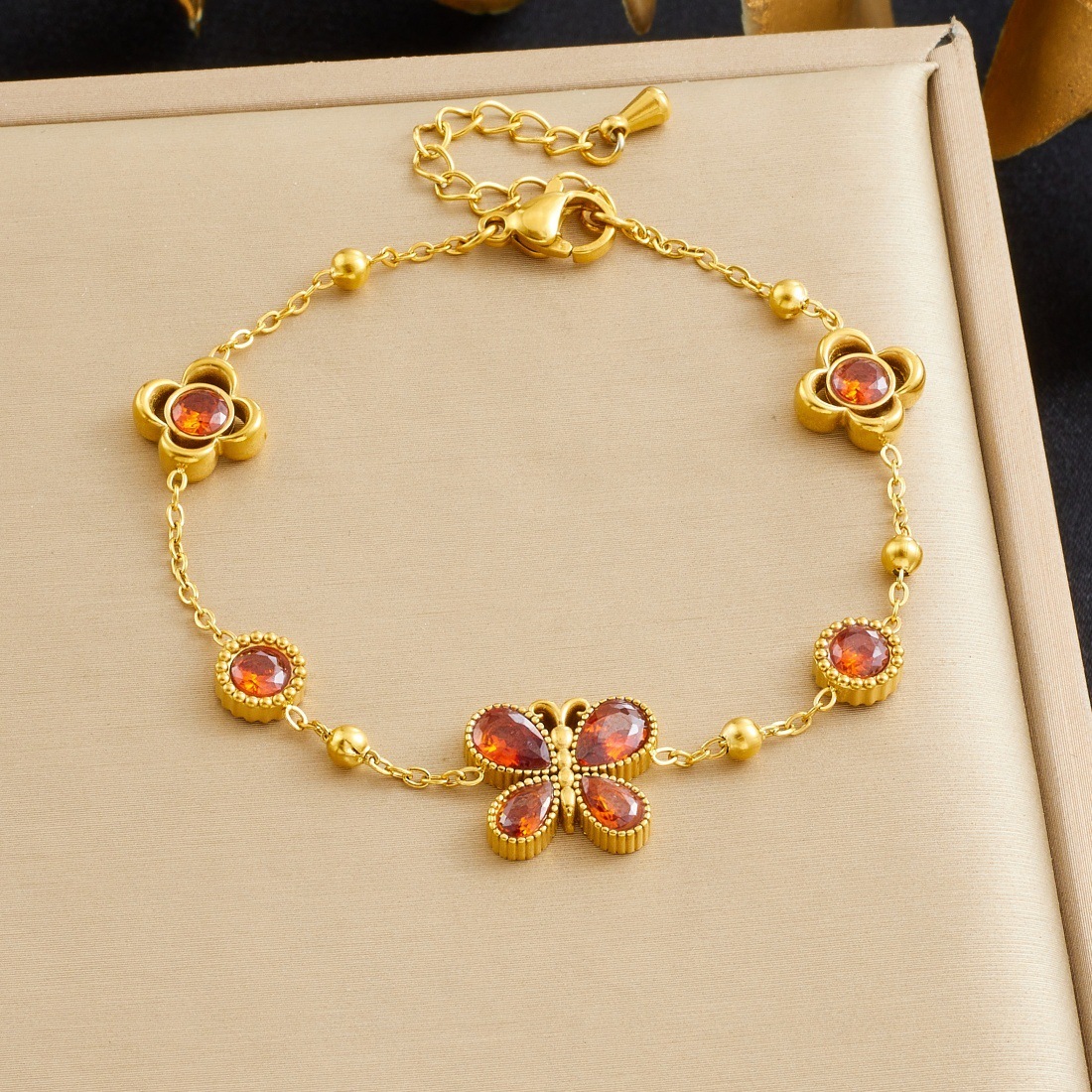 Cross-border fashion rhinestone-encrusted ins style round butterfly and flower accessory pendant gold-plated stainless steel chain accessory bracelet