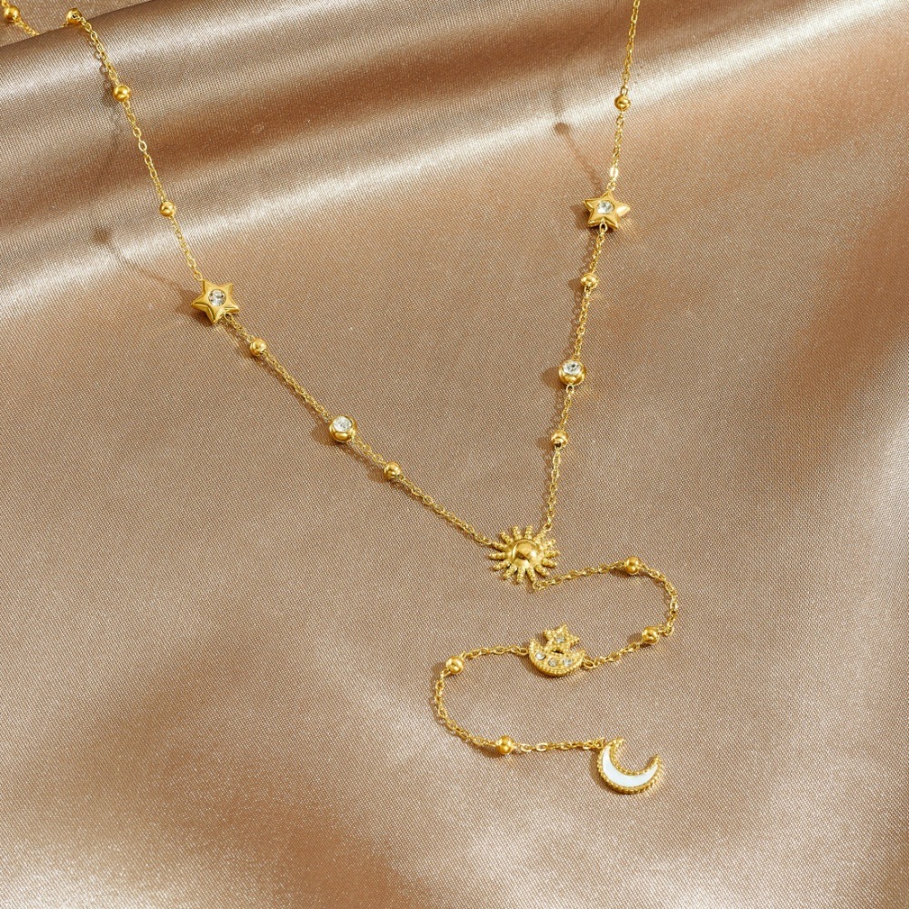 Korean style, fashionable and simple, diamond-encrusted stainless steel gold-plated star, moon and sun pendant, Y-shaped long tassel versatile clavicle chain.