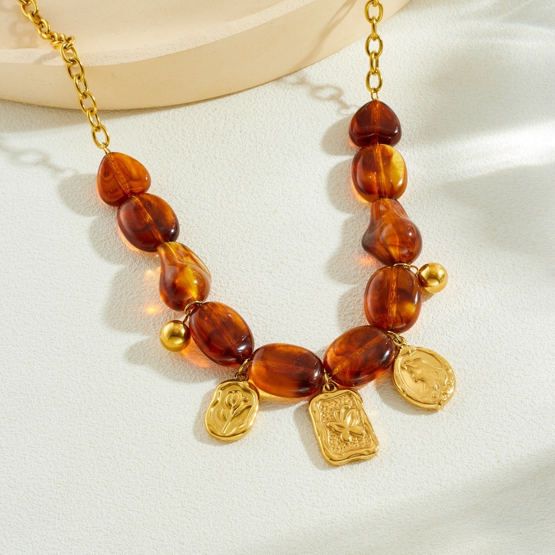European and American cross-border Maillard irregular brown-red resin beaded chain gold-plated embossed butterfly and flower jewelry set