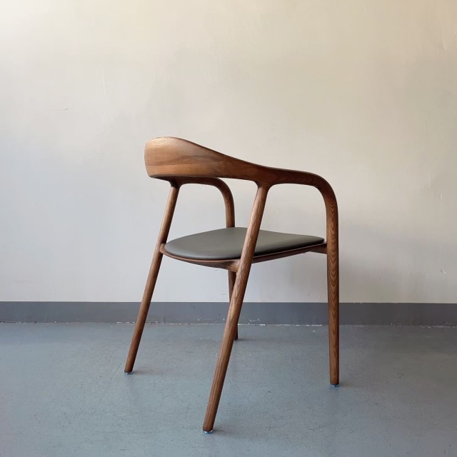 solid wooden chair with vinyl upholstery