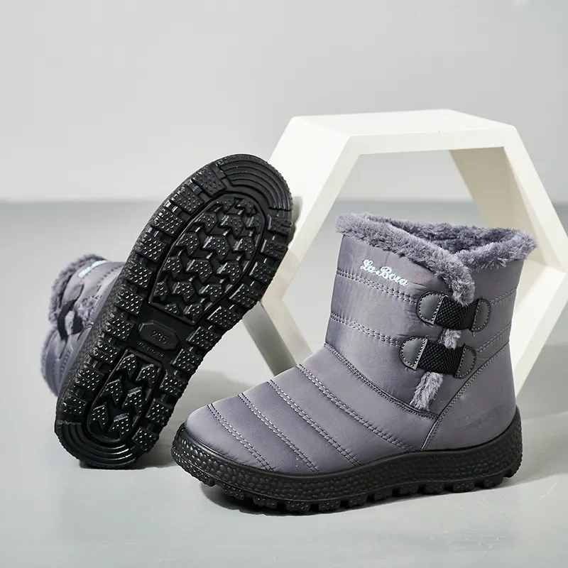 Snowy boots with splash resistant upper for warmth and thickened interior for outdoor use