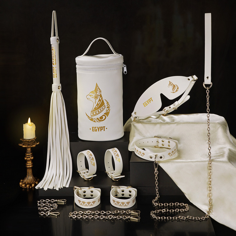 PU Leather Bondage Gear Collar Handcuffs Ankle-Cuffs Eye-Mask Whip Oval-Bag Set White&Gold Color
