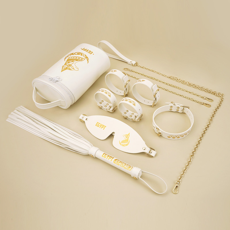 PU Leather Bondage Gear Collar Handcuffs Ankle-Cuffs Eye-Mask Whip Oval-Bag Set White&Gold Color