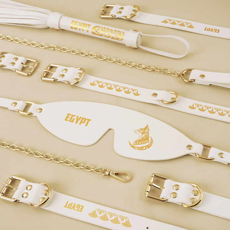 PU Leather Bondage Gear Collar Handcuffs Ankle-Cuffs Eye-Mask Whip Oval-Bag Set White&Gold Color