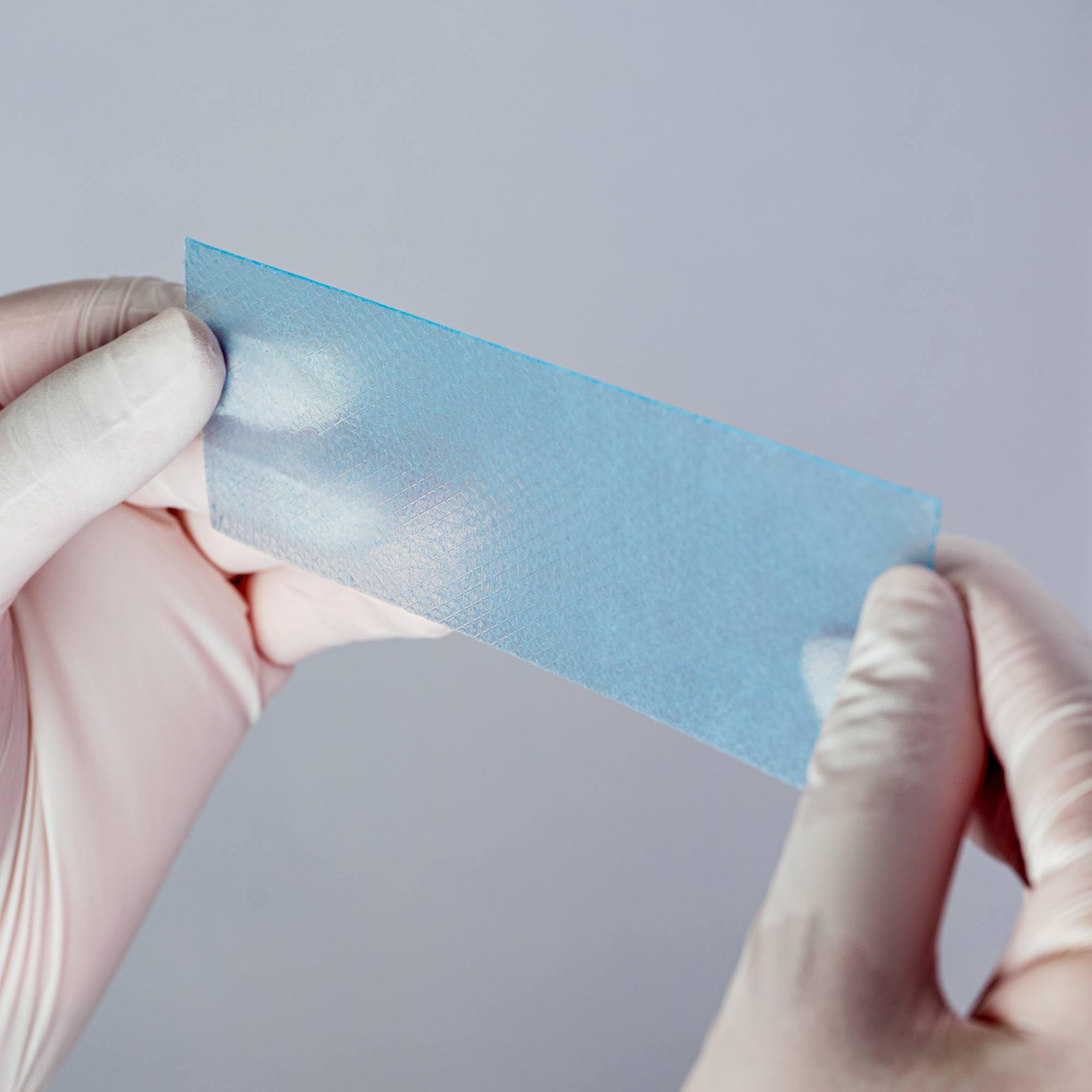 Silicone scar sheet, size 4 cm X 15 cm, color blue, scar care solution