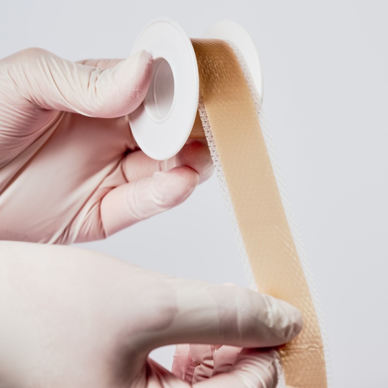 Silicone scar tape roll, size Width 2.5 cm, Lenth 1 m~5 m, color brown, scar care solution