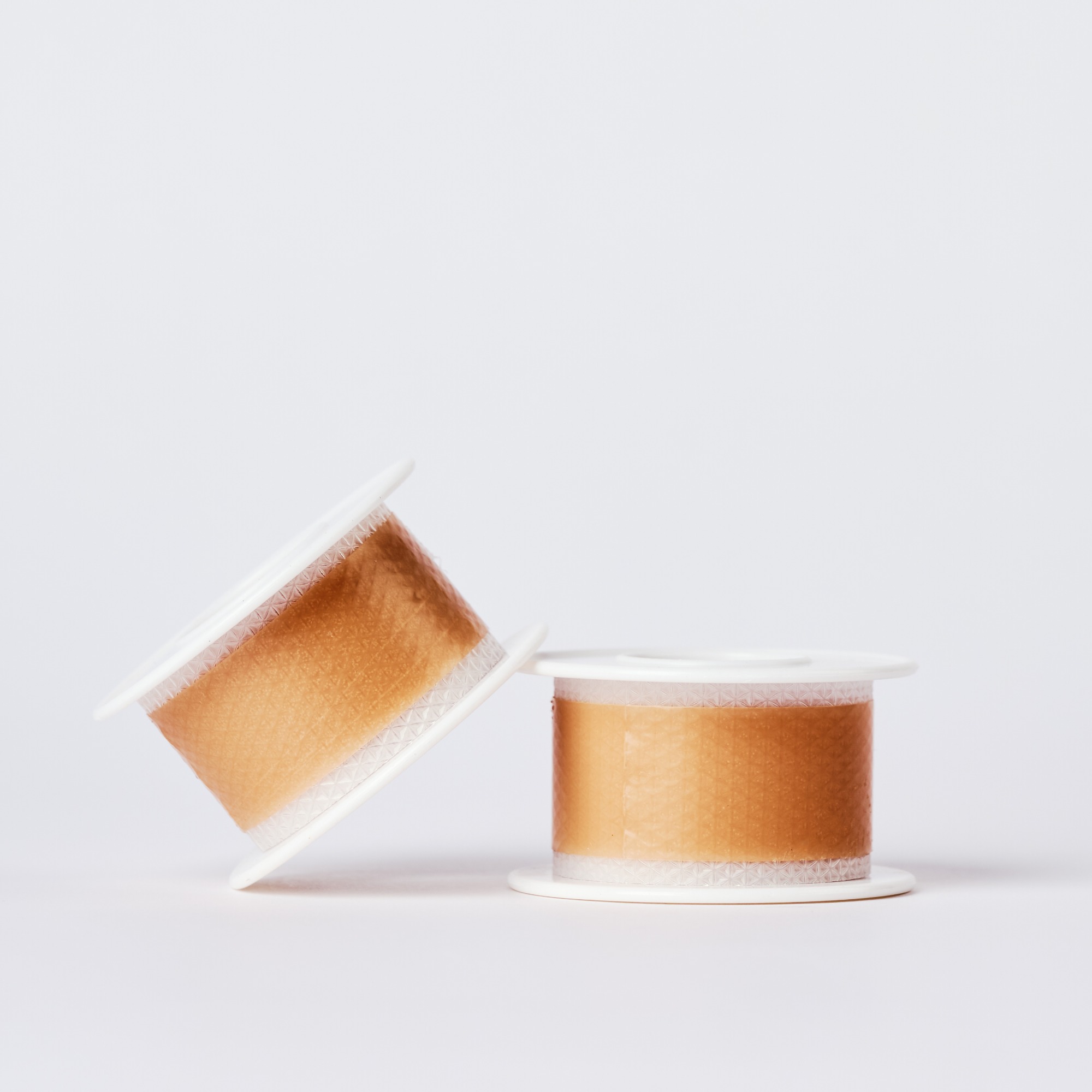 Silicone scar tape roll, size Width 2.5 cm, Lenth 1 m~5 m, color brown, scar care solution