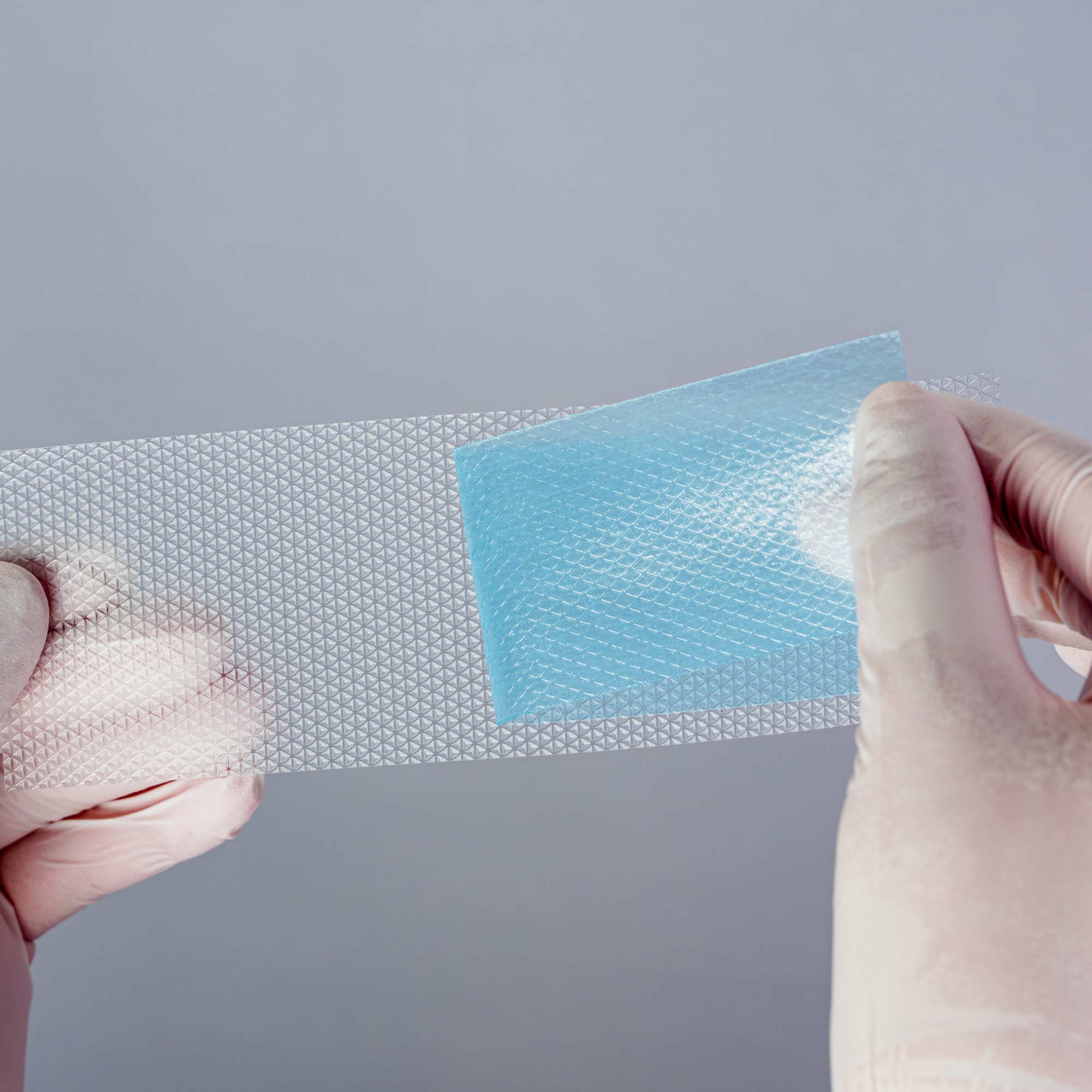 Silicone scar sheet, size 4 cm X 15 cm, color blue, scar care solution