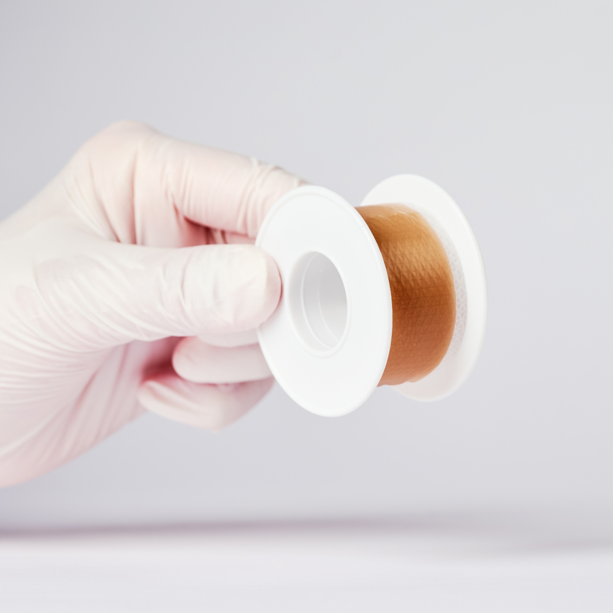 Silicone scar tape roll, size Width 2.5 cm, Lenth 1 m~5 m, color brown, scar care solution
