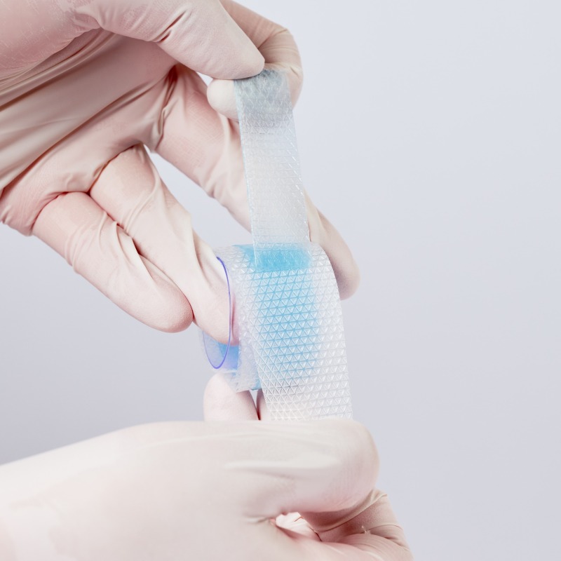 Silicone scar tape roll, size Width 2.5 cm, Lenth 1 m~5 m, color blue, scar care solution