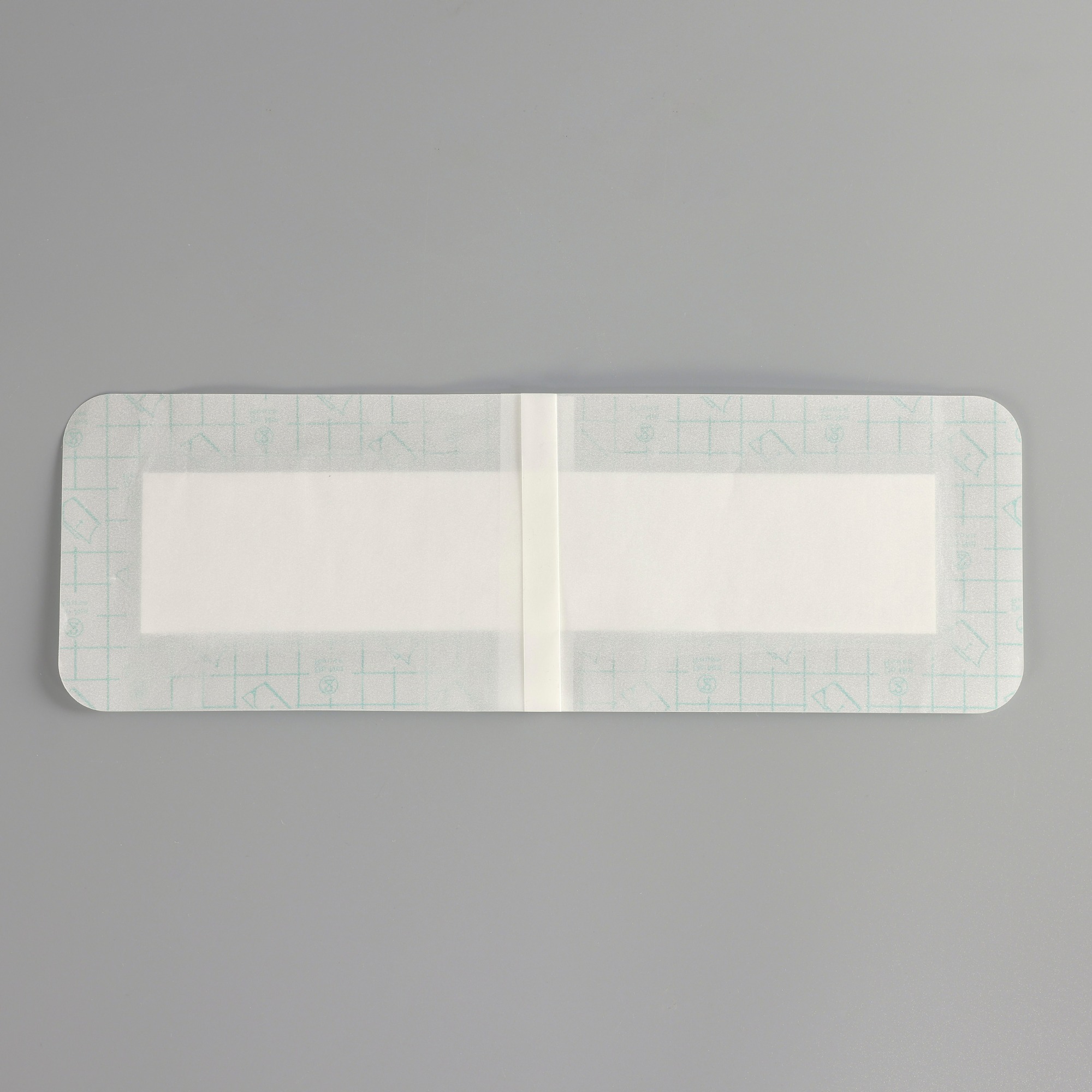 Transparent Film Dressing with pad-Size 10 x 20 cm-Grid Pattern Style- Waterproof breathable Wound care Adhesive Bandage